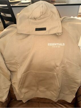 Fear of God Essentials Men’s Tan Hoodie with White Logo